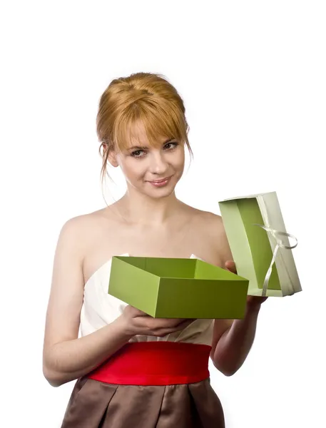 Beautiful slender blonde with bright green gift on white background — Stock Photo, Image