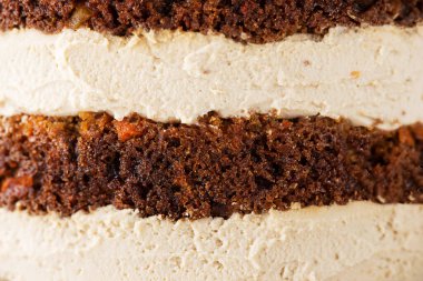 Kremalı havuçlu kek katmanlarının arka planı.