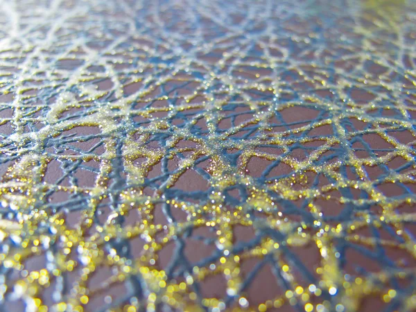 Närbild guld blå grov textil — Stockfoto
