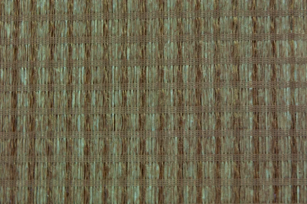 Mat weave with wood and black silk — Stock Photo, Image