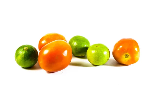 Tomato and small lemon — Stock Photo, Image