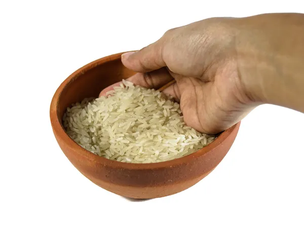 Mano obtener mucho arroz — Foto de Stock