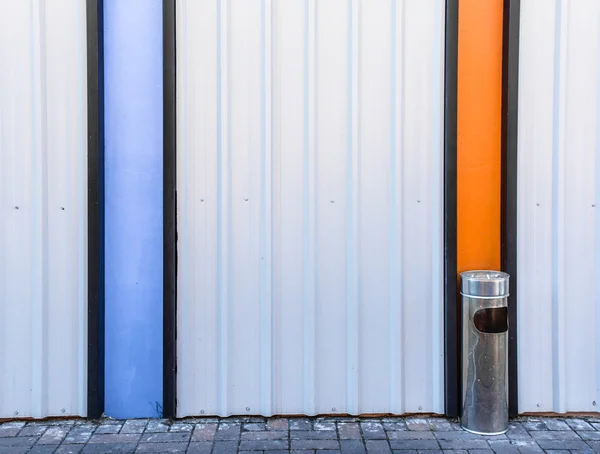 Ashtray bin on steel wall — Stock Photo, Image