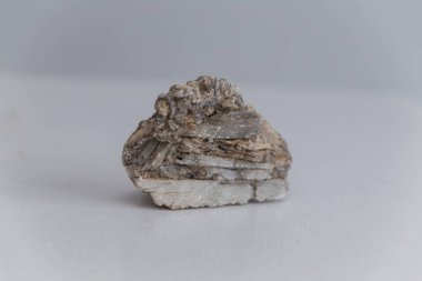 shard of rock close up on a white background