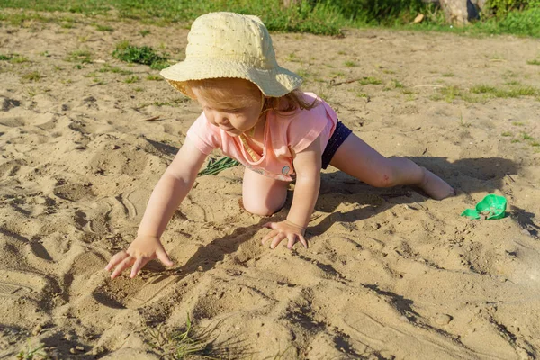 Little Girl Beach Yellow Hat Having Fun Playing Sand Girl Royalty Free Stock Photos