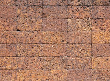 Laterite stone brick wall. clipart
