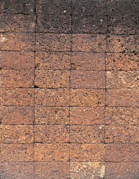 Laterite stone brick wall. — Stock Photo, Image