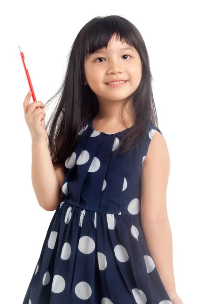 Klein meisje denken met potlood — Stockfoto