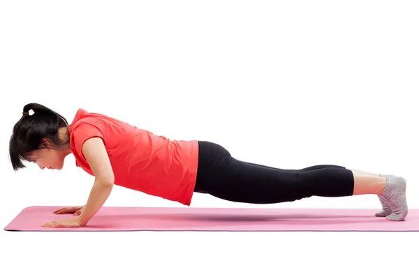 Mujer haciendo ejercicio push up —  Fotos de Stock