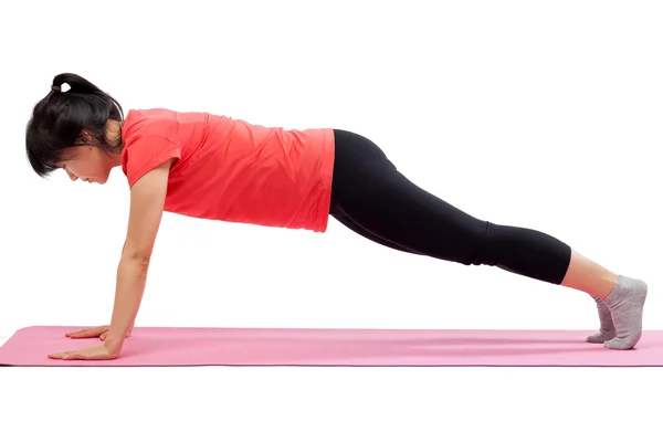 Mujer haciendo ejercicio con pose push up — Foto de Stock