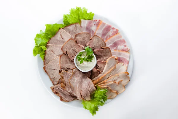 Assorted meat with bacon, ham and lettuce — Stock Photo, Image