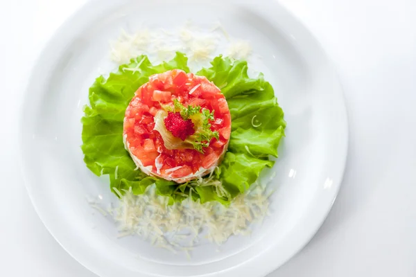 Original salad with caviar, tomatoes and lettuce — Stock Photo, Image