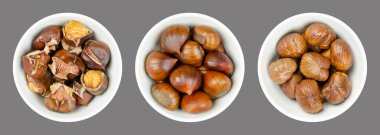 Kabuksuz, kavrulmuş ve haşlanmış kestaneler, gri üzerine beyaz kaselerde kestaneler. Tatlı kestaneler, Castanea sativa, çiğ yenmiş, şekerlenmiş, pişirilmiş, un haline getirilmiş, ya da sıcak atıştırmalık olarak kızartılmış, sokaklarda satılmış..