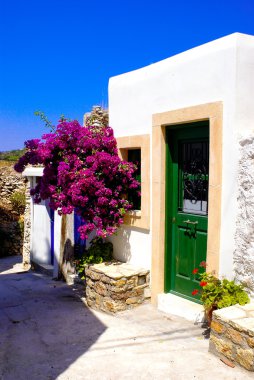 Greek traditional house located at Santorini island clipart