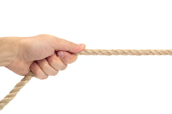 Sola mano tirando de la cuerda sobre fondo blanco — Foto de Stock