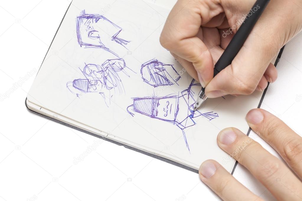 Male designer drawing a character
