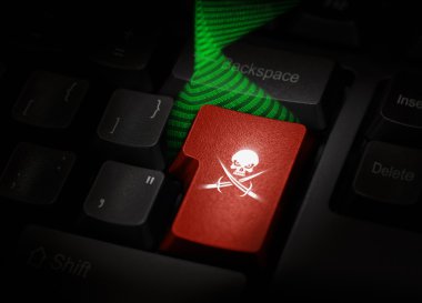 Pirate key on computer keyboard clipart