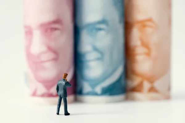 Businessman Figurine Pondering Looking Turkish Lira Banknote Rolls White Background — Stock Photo, Image