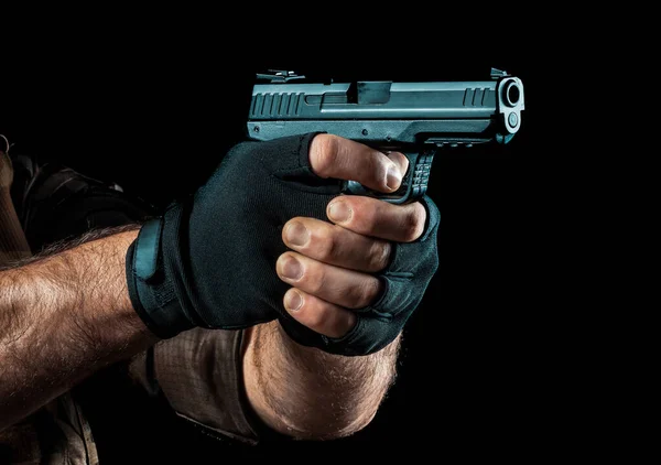 Closeup Man Hand Gloves Holding Gun Two Hand Aiming Target — 스톡 사진