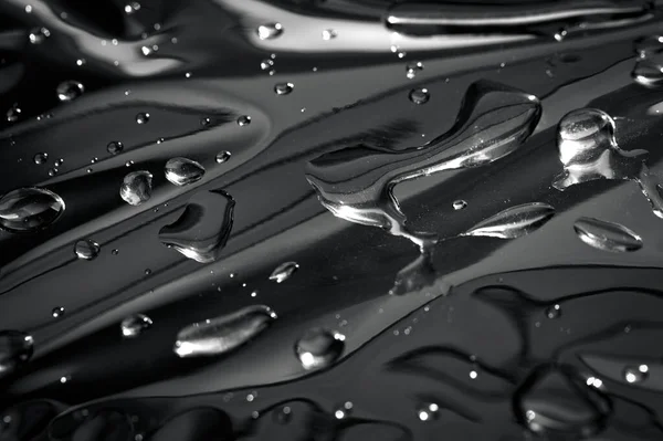 Black White Macro Photo Water Drops Scattered Reflective Metal Surface — Fotografia de Stock