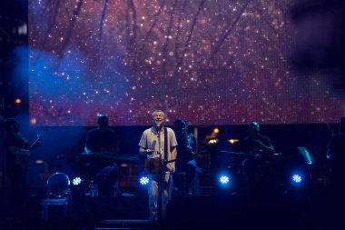 Ankara, Turkey - August 20, 2022: Turkish pop music singer Levent Yuksel performing live music on stage in Armada shopping center in Ankara, Turkey. 