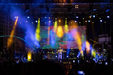 Ankara, Turkey - August 20, 2022: Turkish pop music singer Levent Yuksel performing live music on stage in Armada shopping center in Ankara, Turkey. 