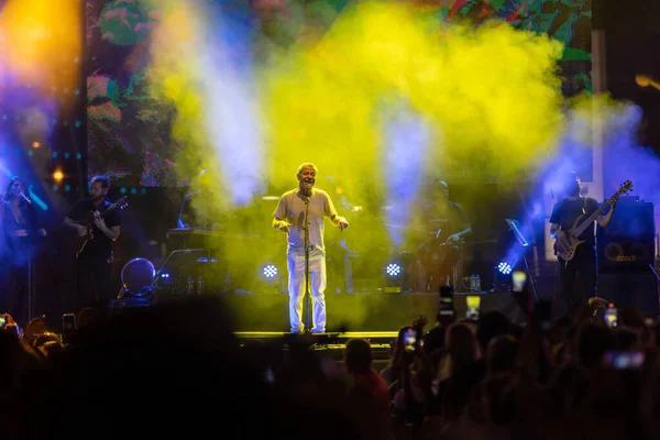 Ankara, Turkey - August 20, 2022: Turkish pop music singer Levent Yuksel performing live music on stage in Armada shopping center in Ankara, Turkey. 