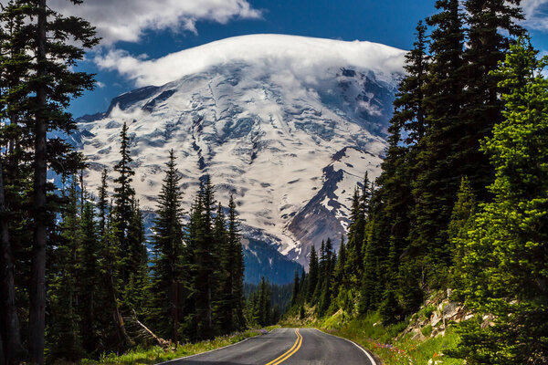 Steep Mountain Road with Stunning View of Cloud Topped Mount Rainier in August 2011.