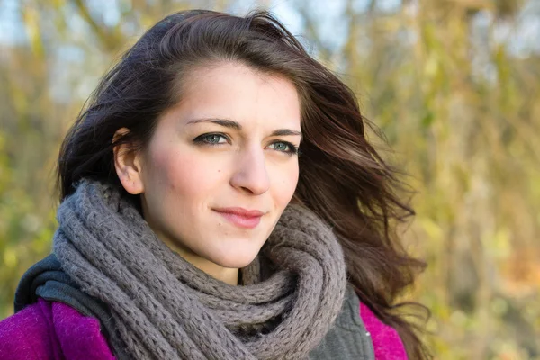 Beauty, young woman with cord scarf outdoors — Stock Photo, Image