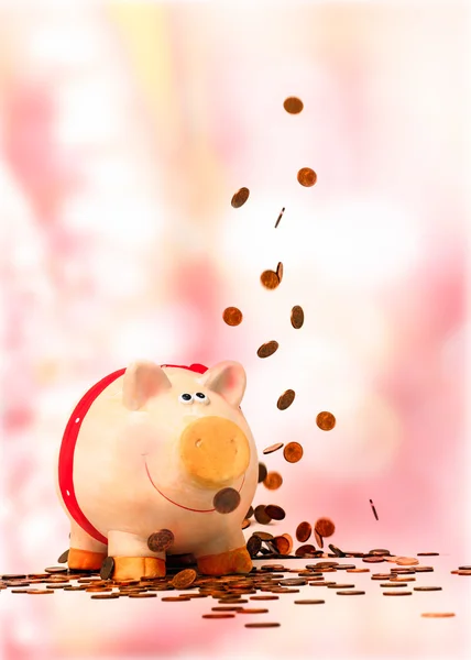 Piggy bank a pénz esőben — Stock Fotó