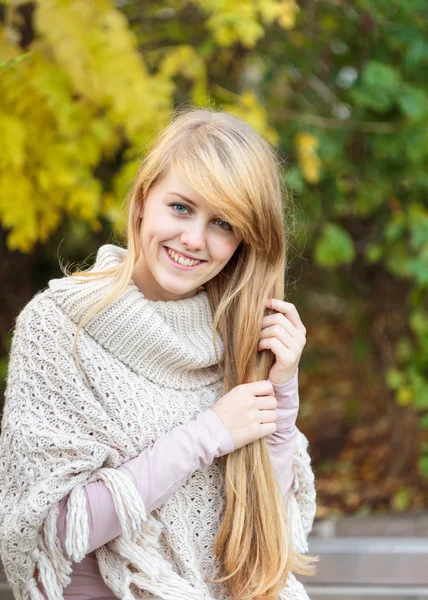 Girl with long blond hair outdoors Royalty Free Stock Images