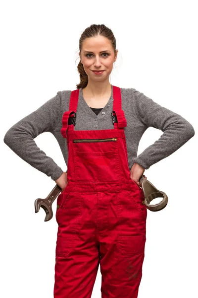Дівчина працівник з гайковим ключем — стокове фото