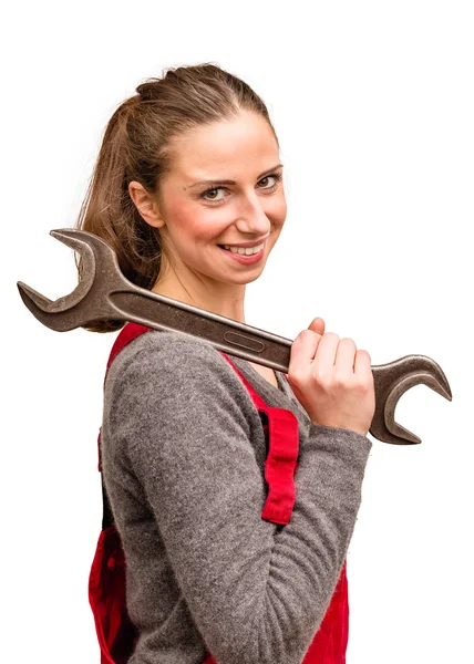 Young female worker with wrench Stock Image