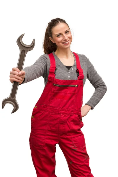 Молода жінка працівник з гайковим ключем Стокове Фото