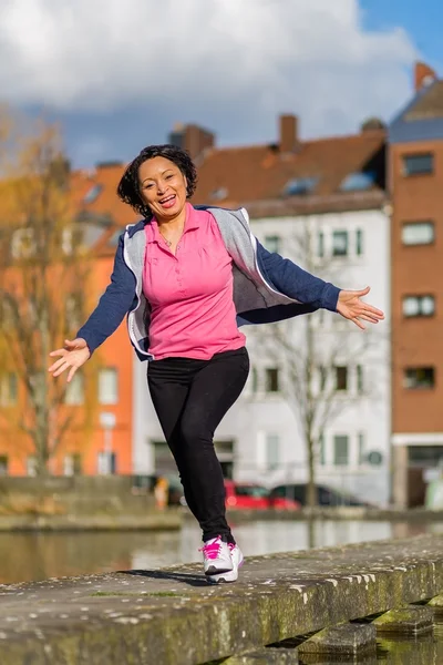 Woman urban sport exercising Stock Image