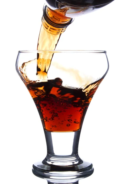 Cola pouring in a glass — Stock Photo, Image