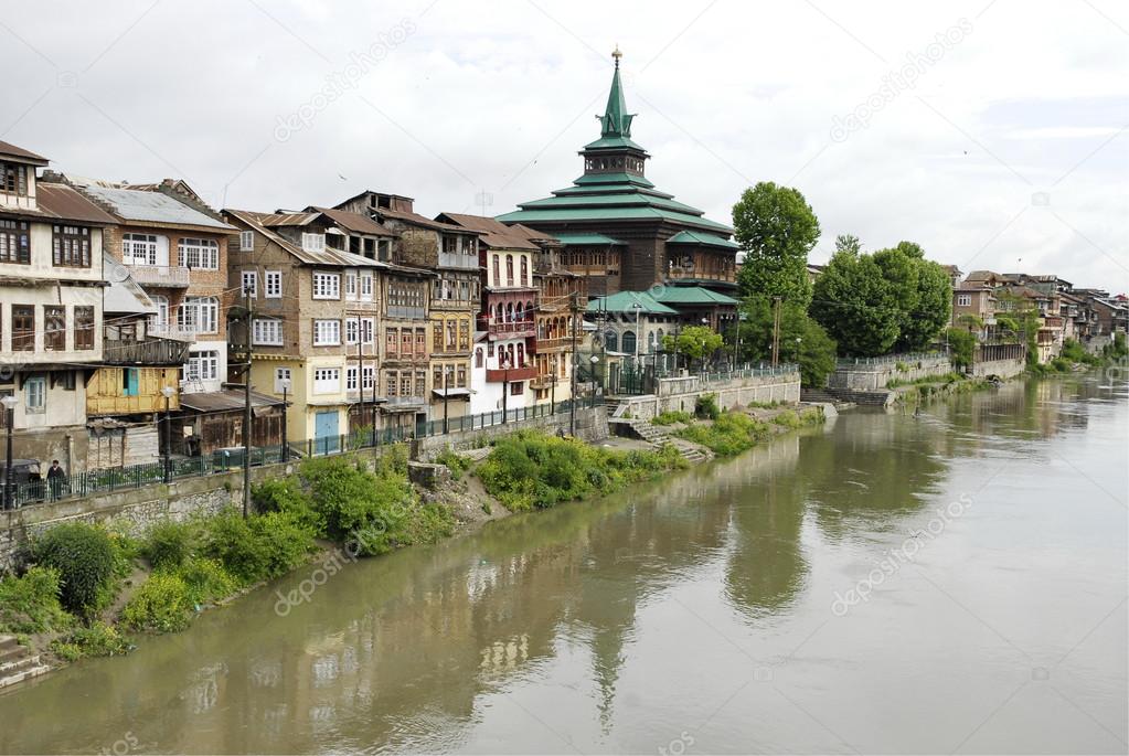 City view in Srinagar with ancient mosque in the background.