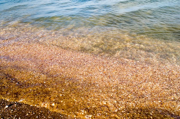 Ola y arena de playa —  Fotos de Stock