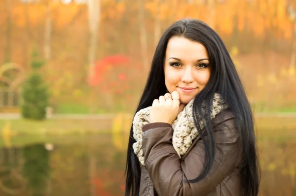 Young pretty woman in autumn park Royalty Free Stock Photos