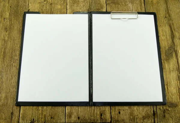 White paper on wood background — Stock Photo, Image