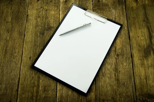 White paper and pen on wood background — Stock Photo, Image