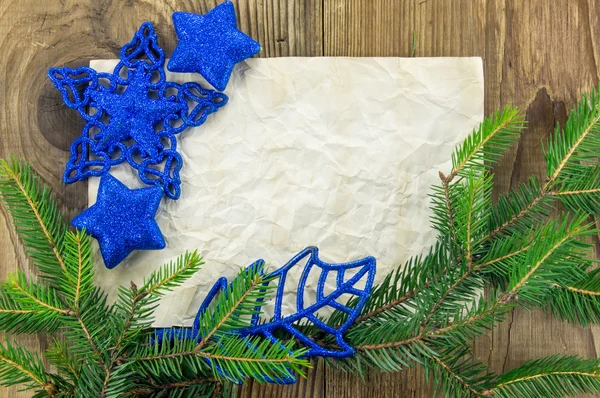 Fondo de Navidad.Hoja de papel vieja en blanco con decoración — Foto de Stock