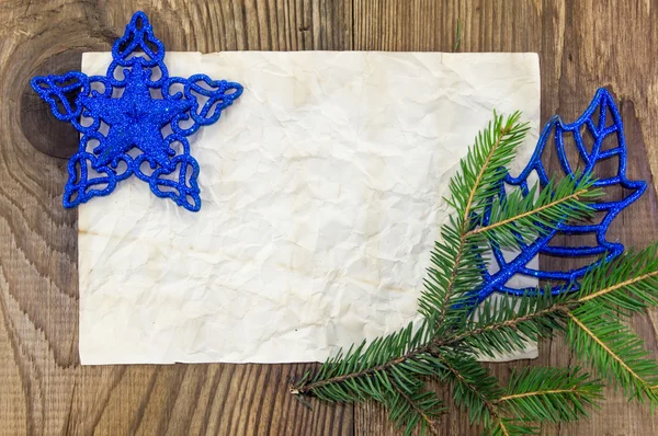 Fondo de Navidad.Hoja de papel vieja en blanco con decoración — Foto de Stock