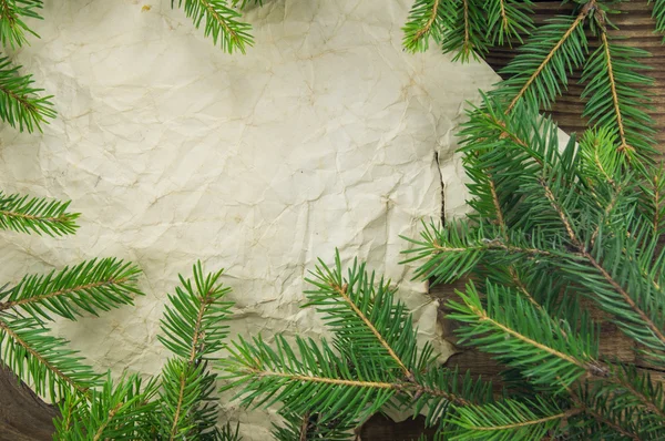 Sfondo natalizio. Vecchio foglio di carta bianco con decorazione — Foto Stock