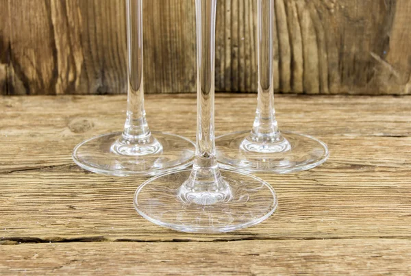 Glass with champagne on a wooden background — Stock Photo, Image