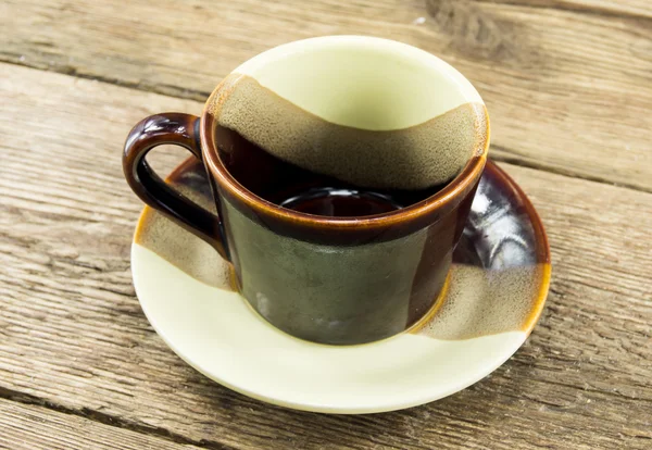 Taza de café sobre fondo de madera — Foto de Stock