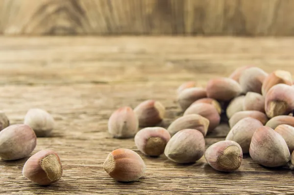 Filberts on a wooden table. Close-up shot. — Stock Photo, Image