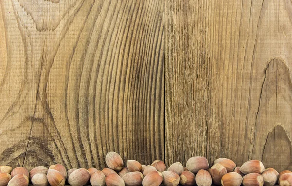Filberts on a wooden table. Close-up shot. — Stock Photo, Image