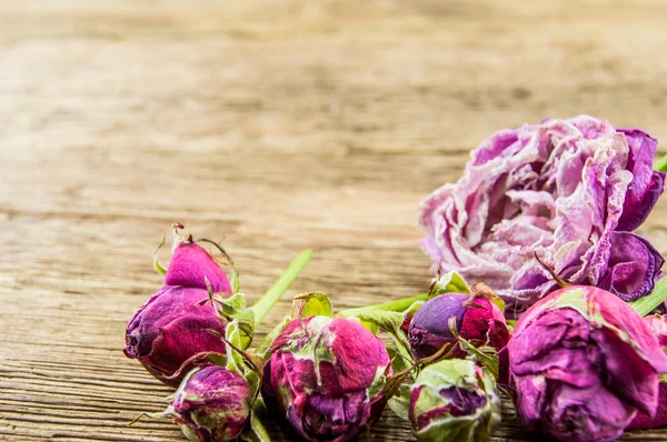 Red rose over wooden background — Stock Photo, Image