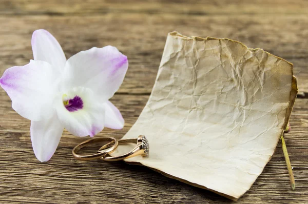 Orchid flower on wooden background with space for inscriptions — Stock Photo, Image